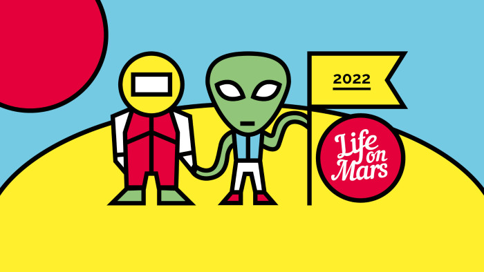 An alien and astronaut standing on a yellow planet. The alien has a flag reading '2022'.