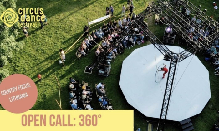 Text from the call with a photo of an outdoor circus performance with an audience, seen from above. 