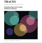 Text of the call with an image of circles representing photoluminescence of perovskite crystals.