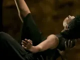 A person being held in the horizontal. 